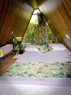 a bedroom with a bed in a tent at Tilawa La Fortuna Glamping in Ángeles