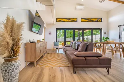 a living room with a couch and a table at Casa Nonos in Libertad