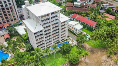 an aerial view of a large building with a pool at Beachfront view large Condo with Pools PVT luxury patio in great location in Jacó