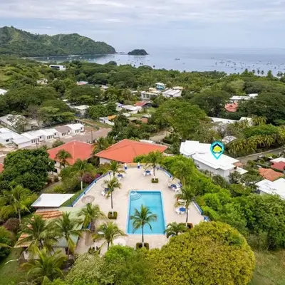 Modern Top-Floor Condo with Panoramic Views and Community Pool