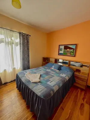 a bedroom with a large bed in a room at Monteverde Ecolodge in Monteverde Costa Rica