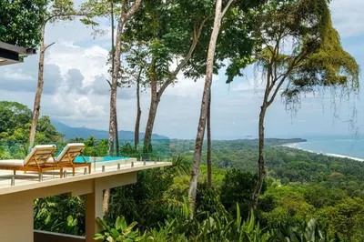 a view of the ocean from a house at Casa LaVista - by Pura Villas in Uvita