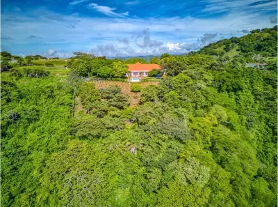 an aerial view of a house on a hill at Finca Orgánica Sweet Home Mango in San Mateo