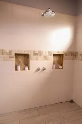 a bathroom with a shower with three sinks at Volcano & Lake View Oasis with Scenic Tub in El Castillo de La Fortuna