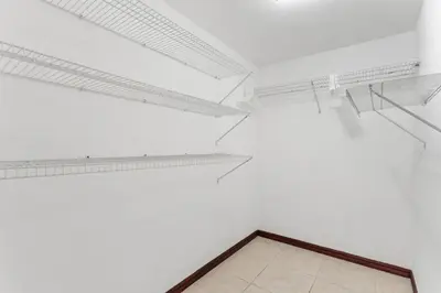 an empty room with white walls and white ceilings at Mir4 Stunning OceanView 2BD Over Tamarindo in Tamarindo