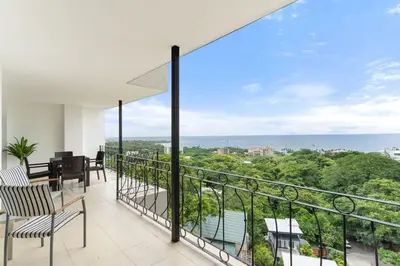 an apartment balcony with a view of the ocean at Mir4 Stunning OceanView 2BD Over Tamarindo in Tamarindo
