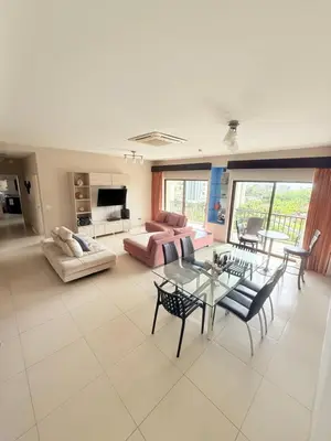 a living room with a couch and a table at Jaco Bay Unit 8th Floor in Jacó