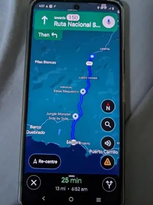 a cell phone with a map on the screen at Pacific villa lisn in Nicoya