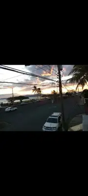 a white car parked in a parking lot at sunset at No está disponible in Puntarenas