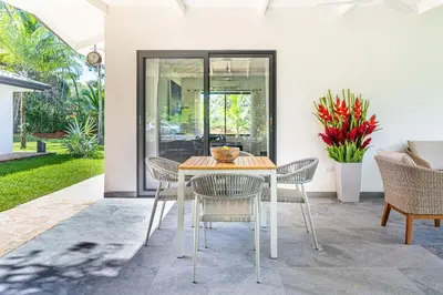 a dining room with a table and chairs at Mandala Ojochal Boutique Resort & Retreat Center in Ojochal