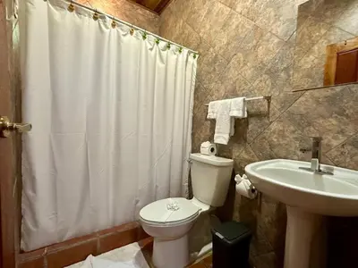 a bathroom with a toilet and a sink at Jungle Creek, Casita Colibri, Studio with Big Patio in Quepos