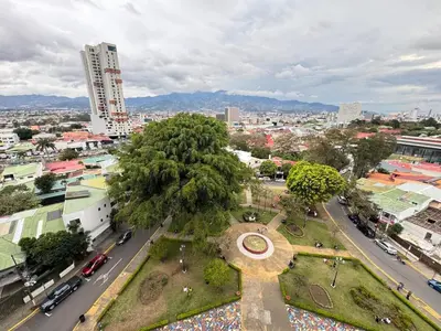 an aerial view of a city with a park at Original Studio ESCALANTE in San José