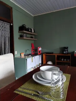 a table with a bowl and a plate on it at Rous place# 2 in Fortuna