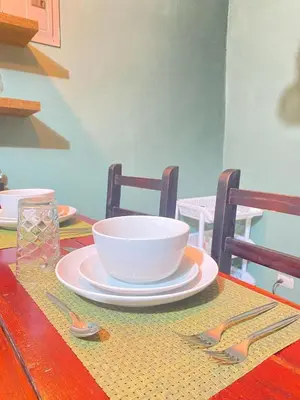 a table with a bowl and a plate on it at Rous place# 2 in Fortuna