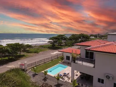 an aerial view of a house and the ocean at Playa Hermosa 44 - Beach House Getaway in Playa Hermosa