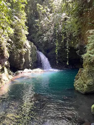 a waterfall in the middle of a river at Pozas y Cascadas La Presa Habitación 4 in Río Cuarto