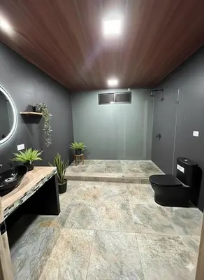 a bathroom with a sink and a toilet in a room at Pozas y Cascadas La Presa Habitación 4 in Río Cuarto