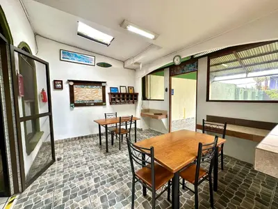 a dining room with tables and chairs in a building at Apartment F -G Heredia – Good Location in Flor