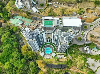 an overhead view of a city with tall buildings at Apartment with air conditioning and 20 minutes from the airport in San José