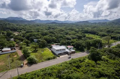 an aerial view of a house in the middle of a road at Tropical Oasis with Casita — Minutes to Tamarindo in Villarreal