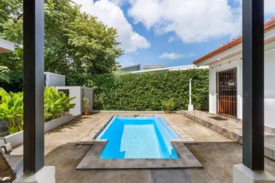 a swimming pool in the backyard of a house at Tropical Oasis with Casita — Minutes to Tamarindo in Villarreal