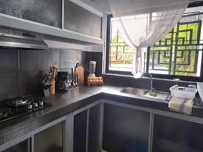 a kitchen with a sink and a window at Costa Verde Retreat 1 - Ground Floor in Quepos