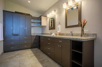 a bathroom with a sink and a mirror at Villa Ballena-luxury Ocean view in Uvita