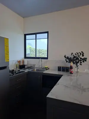 a kitchen with a sink and a window at Villa Kaza Proyecto in Santa María