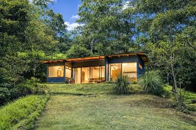 a small house in the middle of the forest at Olingo Monteverde - Studio Apartment with Jacuzzi in Monteverde Costa Rica
