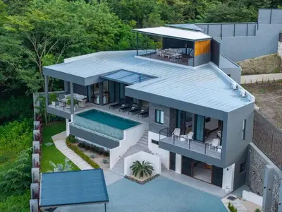 an aerial view of a house with a swimming pool at Beach Mode Luxury 3-Story House in Tamarindo in Tamarindo