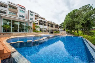 a swimming pool in front of a building at Escazu Guachipelin Peaceful Getaway, Pool, Wi-Fi & Work Space CR MARIPOSA RENTALS in San Rafael