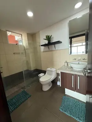 a bathroom with a toilet and a sink at Escazu Guachipelin Peaceful Getaway, Pool, Wi-Fi & Work Space CR MARIPOSA RENTALS in San Rafael