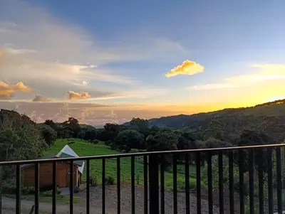 a view from the balcony of a house at Cabaña El Trogon in Monteverde Costa Rica
