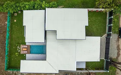 an overhead view of a white house with a pool at Uvita-New luxury-sleeps 6-private pool-huge patio in Uvita