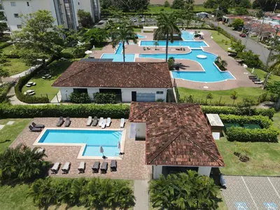 an overhead view of a pool at a resort at Luxury Oceanfront Penthouse w Loft and 2 Balconies in Bejuco