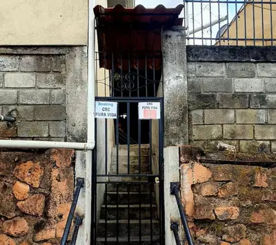 an entrance to a building with a metal door at Vicky's Room - NO PARKING SITE in Santiago Este