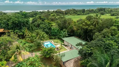 an aerial view of a house with a swimming pool at Villa Marala in Esterillos