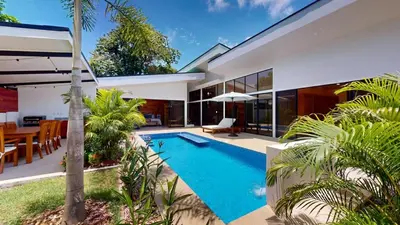 an image of a swimming pool in a house at Casa Luna Rosa in Uvita