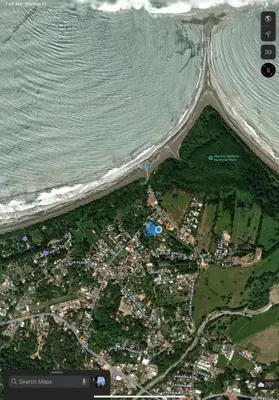 a map of a beach with a body of water at Casa Luna Rosa in Uvita