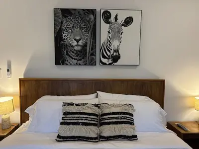 two pictures of zebras and a zebra on a bed at Luxury Beachfront in Playa Tivives, Puntarenas with Ocean Views,Pool in Tivives