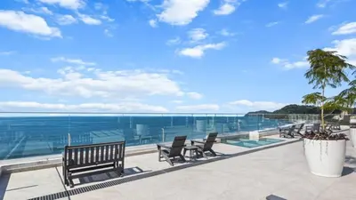 a view of the ocean from the balcony of a house at Pacific Point - Pure Vida in Jaco, Costa Rica in Jacó
