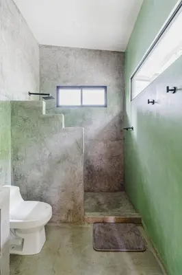 a bathroom with a toilet and a shower and a sink at Casa con piscina privada a 700 m de Playa de Santa Teresa in Santa Teresa Beach