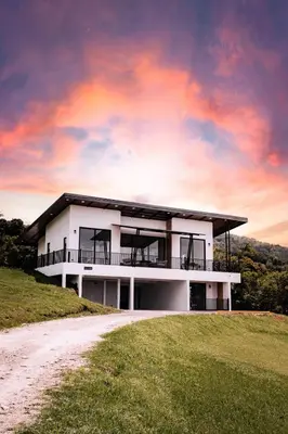 a white house on top of a hill at Casa Dalia in Monteverde Costa Rica