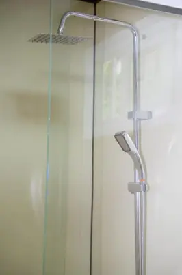a shower with a glass door in a bathroom at Villa Azul-Colibrí, Río Celeste in Rio Celeste