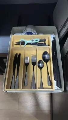 a tray with utensils in a drawer at Central and comfortable mini apartment in San Sebastian in San José