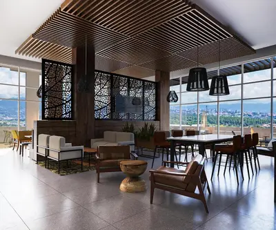 a dining room with a table and chairs and windows at Hyatt Place Cariari/Convention Center in San José