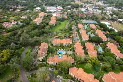 an overhead view of a suburb with houses at Elegant Condo in High-End Resort Community with Pool and Beach Club Access in Coco