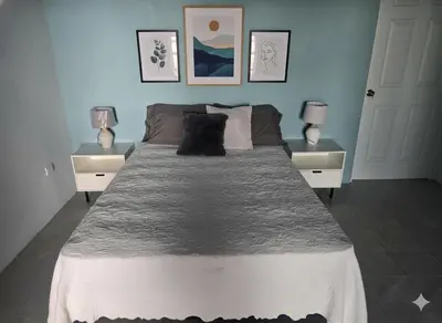 a bedroom with a large bed with two night stands at Uvita, Bahía Ballena, Ocean View in Uvita