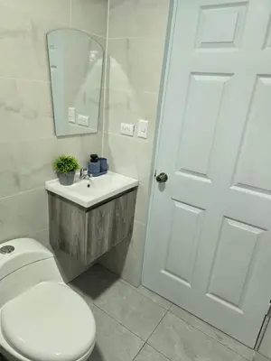 a bathroom with a toilet and a sink and a mirror at Uvita, Bahía Ballena, Ocean View in Uvita