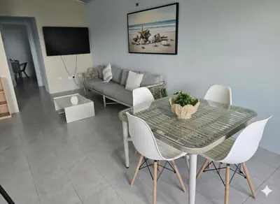 a living room with a table and a couch at Uvita, Bahía Ballena, Ocean View in Uvita